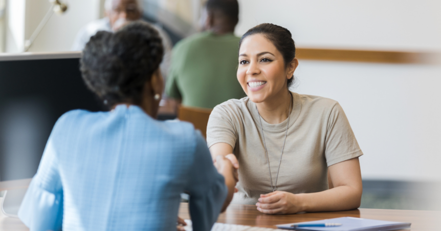 women doing business, shaking hands